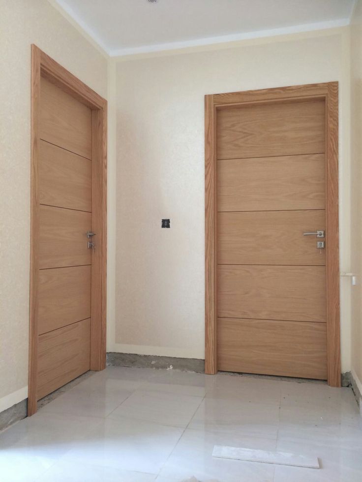 Puertas interiores en acabado madera instaladas por SC Interior